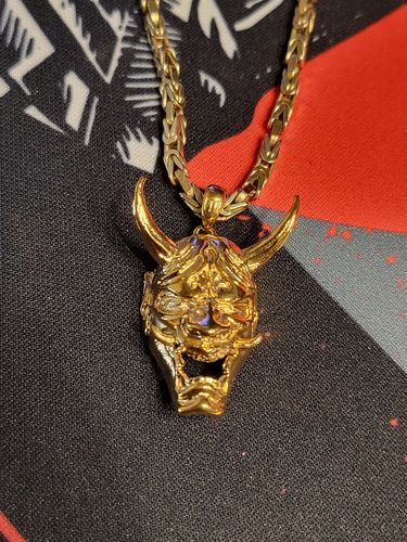 Customer photo review of Oni Mask Pendant - Gold