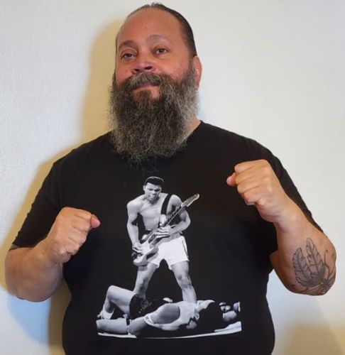 Customer photo review of Ali "Axe" Tee