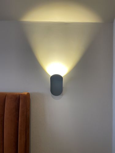 Customer photo review of Minimalist Modern Wall Sconce in Black/White Finish