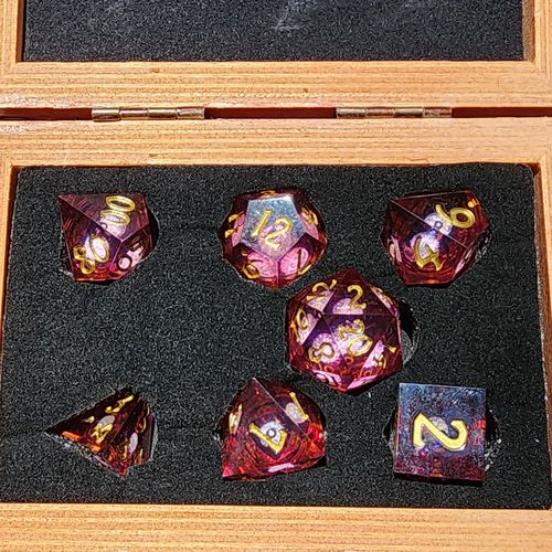 Customer photo review of Dark Red Liquid Core Resin DnD D&D Dice Set