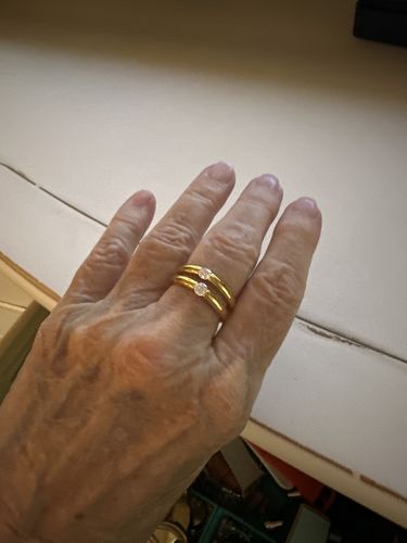 Customer photo review of Solitaire Tension Set Moissanite High Polished Engagement Ring