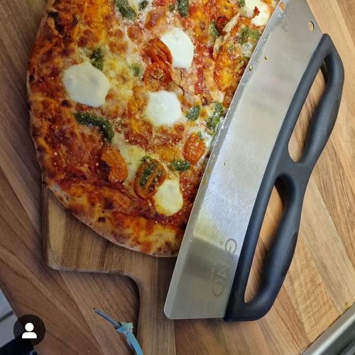 Customer photo review of Rocker Style Pizza Cutter