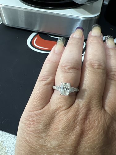 Customer photo review of Three Stone Radiant Moissanite And Trapezoid Sidestone Pave Engagement Ring