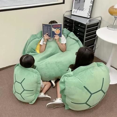 Customer photo review of Puffy Wearable Turtle Plush