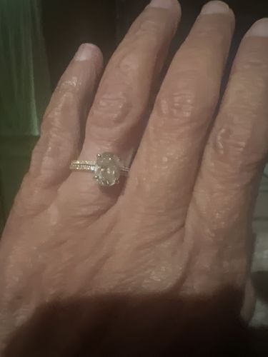 Customer photo review of Sparkling 1.80 CT Oval and Round Cut Diamond Engagement Ring in 14KT Yellow Gold