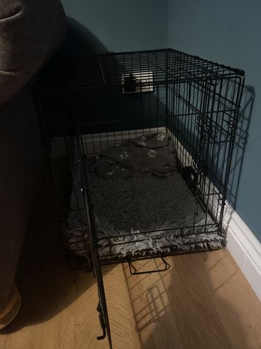 Customer photo review of Dog Crate, Heavy Duty Dog Cage With 2 Doors