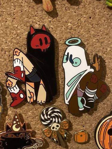 Customer photo review of Angel and Devil Ghost Enamel Pins