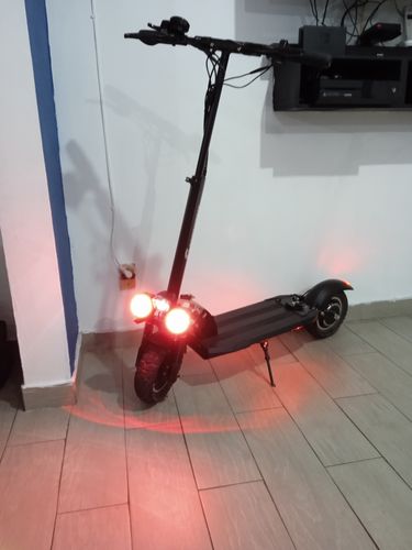 Customer photo review of Scooter Electrico Con Asiento Luz Led Usb Alarma 48 Km/h