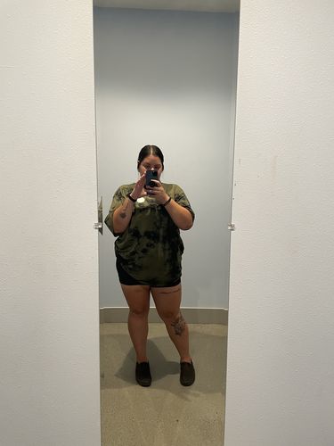 Customer photo review of Salty Savage Unisex “OG Smile” Oversized Crew Tee | Basic