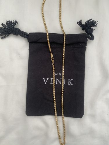 Reseña con foto de un cliente sobre Cadena Snake Oro