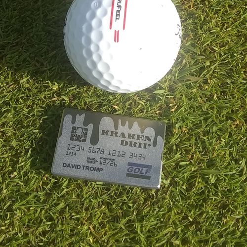Customer photo review of Gold Drip Credit Card Ball Marker - Titanium