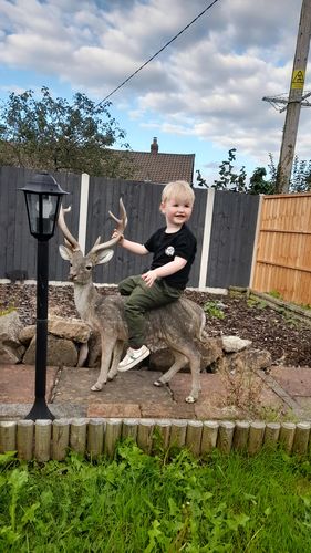 Customer photo review of Somebody's Feral Child Front & Back Graphic Tee