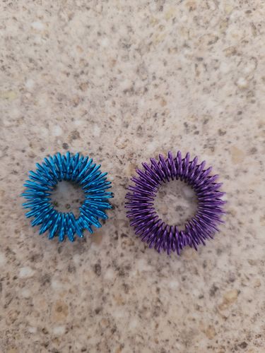 Customer photo review of Finger Spikey DUO - Set of Both Standard & Tighter Finger Spikey Fidgets - by Kaiko