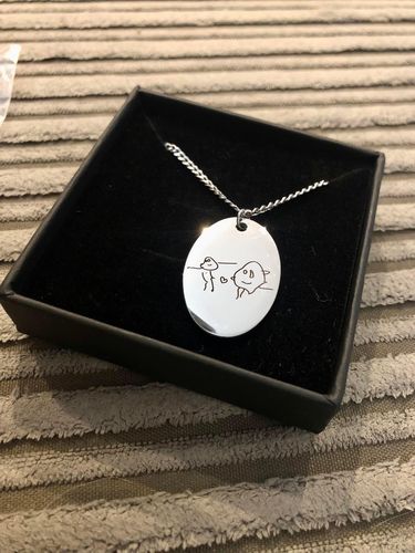 Customer photo review of LOANYA Personalised Children's Drawing Necklace With Oval Pendant