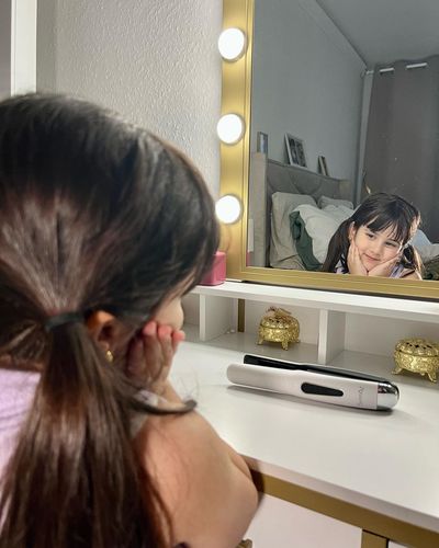 Customer photo review of SUNMAY Voga 2 in 1 Cordless Hair Straightener and Curler for Travelling