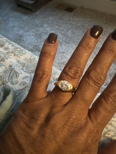 Customer photo review of Solitaire Oval Moissanite Half Bezel Set Engagement Ring