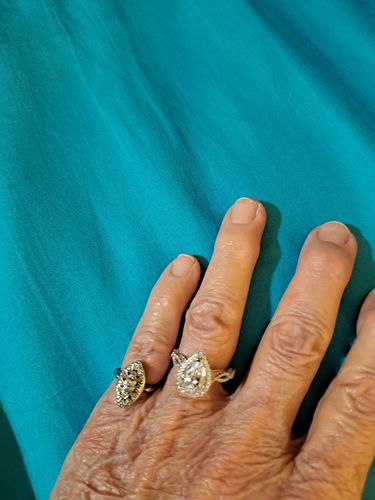 Customer photo review of Vintage Halo Pear Cut White Sapphire Infinity Sterling Silver Ring