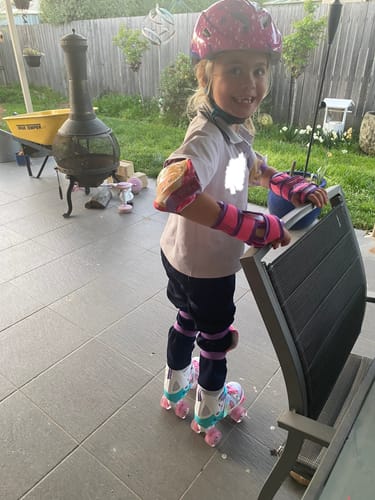 Customer photo review of Kids Adjustable Roller Skates with different sizes and multiple colours