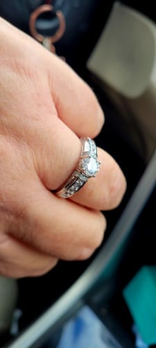 Customer photo review of Moissanite With Channel Set Sapphire Accents Engagement Ring