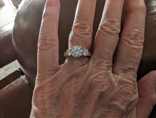 Customer photo review of Vintage Three Stone Moissanite Scroll Filigree Engagement Ring