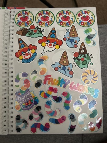 Customer photo review of Space Ghosts Duo Large Reusable Sticker Book