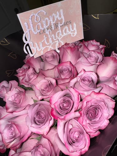 Customer photo review of Purple Rose Bouquet