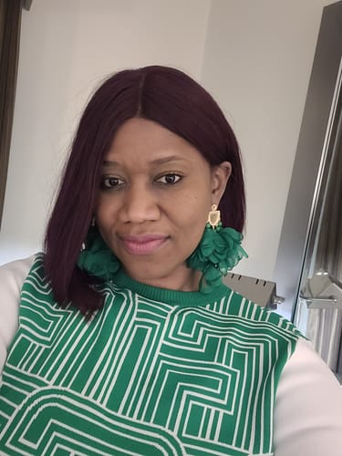 Customer photo review of Green Flower Petals Puff Earrings