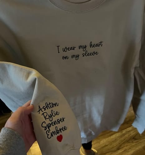 Customer photo review of ‘I wear my heart on my sleeve’ Personalised Sweatshirt