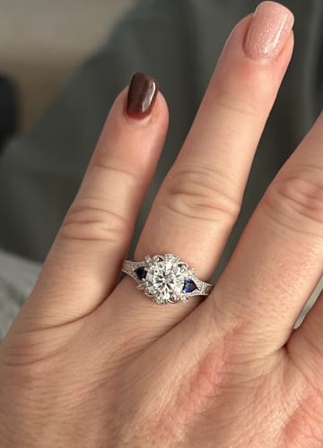 Customer photo review of Vintage Halo Moissanite With Sapphire Milgrain Engagement Ring