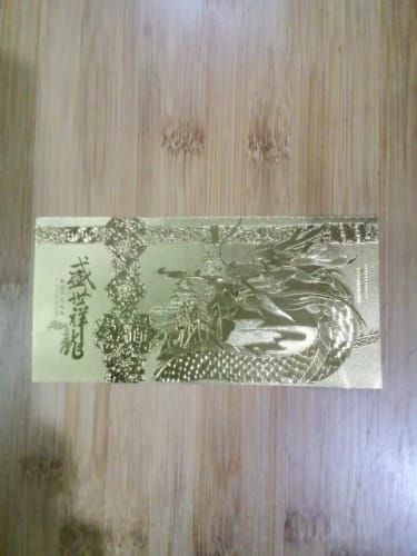 Customer photo review of GOLD LUCKY DRAGON FOIL - GOOD LUCK CHARMS FOR MONEY