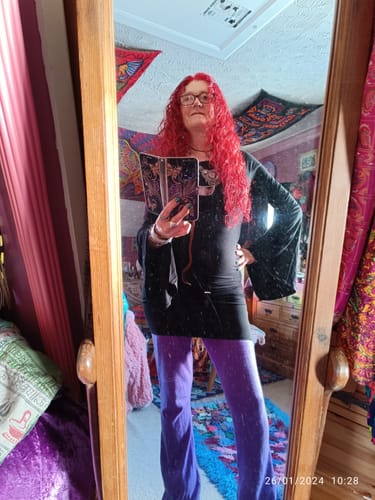 Julie G. review of ANGEL WING SLEEVE DRESS TOP BLACK image 1 out of 2