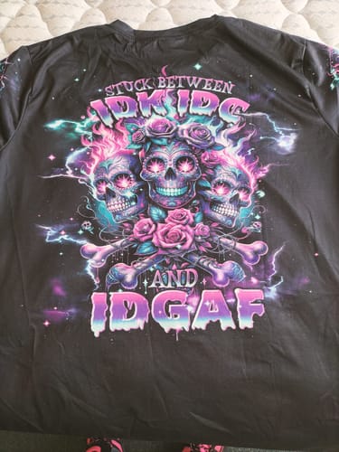Customer photo review of STUCK BETWEEN IDK IDC AND IDGAF 3 ROSE SKULLS ALL OVER PRINT - TLNT2812232