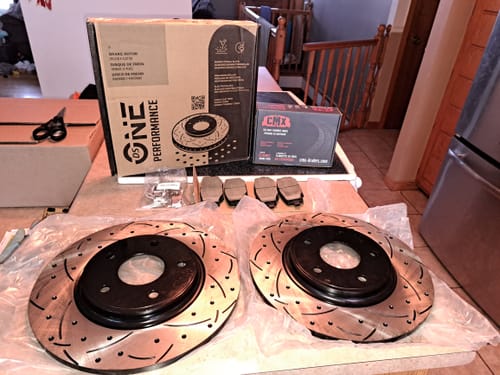 Customer photo review of Rear Coated Drilled Slotted Disc Brake Rotors And Ceramic Pads Kit For Dodge Grand Caravan Journey Chrysler Town & Country Ram C/V Volkswagen Routan KDC-100738