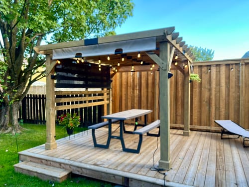 Customer photo review of SUNJOY Outdoor Patio 10x11 Modern Wooden Frame Privacy Screen Hot Tub Pergola Kit with Tan Adjustable Canopy