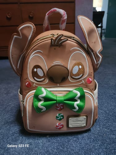 Customer photo review of Loungefly Disney Lilo & Stitch Scented Gingerbread Cosplay Mini Backpack