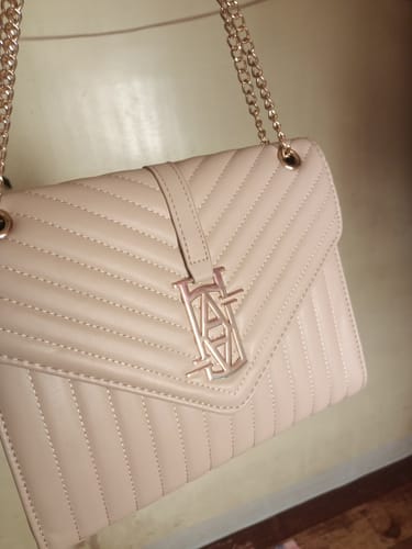 Customer photo review of MADRID LEATHER ENVELOPE BAG