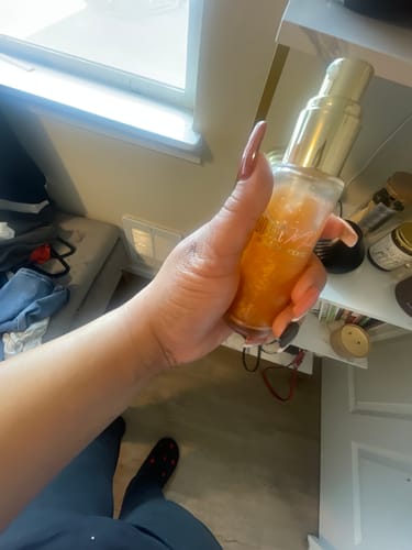 Customer photo review of Shimmering Body Oil