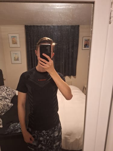 Customer photo review of 465 Superhero Compression Tees