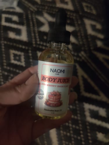 Customer photo review of BOGO Naomi Body Juice Oil