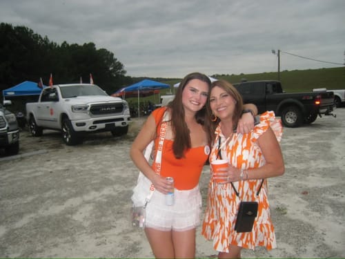 Customer photo review of Abby Tailgate Time Dress - Orange and White
