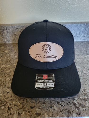 Customer photo review of Custom Leather Patch Trucker Hat - Richardson 112