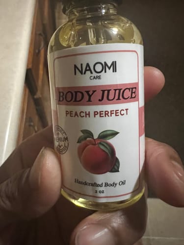 Customer photo review of BOGO Naomi Body Juice Oil