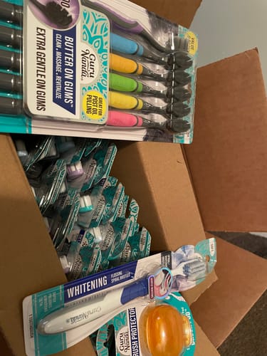 Customer photo review of BUTTER ON GUMS TOOTHBRUSH, COLORS MAY VARY (24-PACK)
