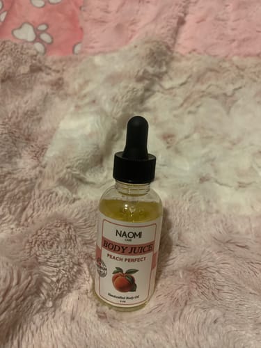 Customer photo review of BOGO Naomi Body Juice Oil