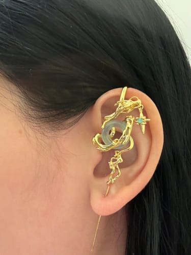 Customer photo review of "Loong" Platinum Plated Statement Abstract Dragon Jade Needle Piercing Dangle Earring