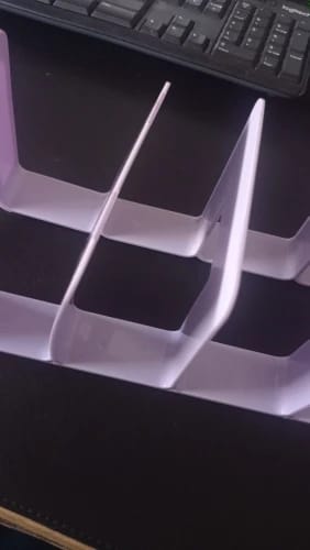 Customer photo review of ELMAS Stylish 4-Grid Bookends for Organized Workspaces