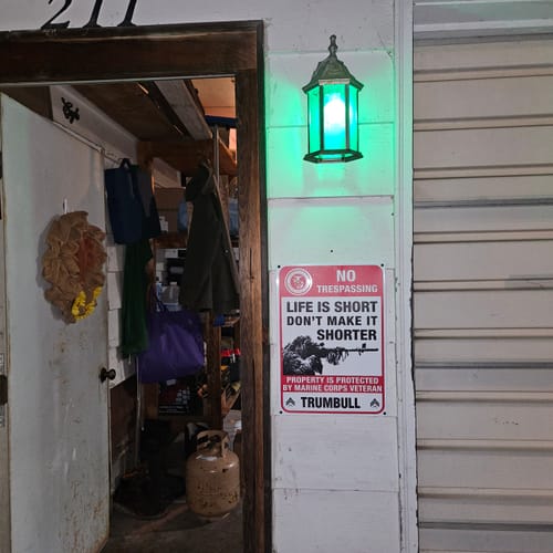 Customer photo review of Personalized Metal Sign for a Veteran - No Trespassing