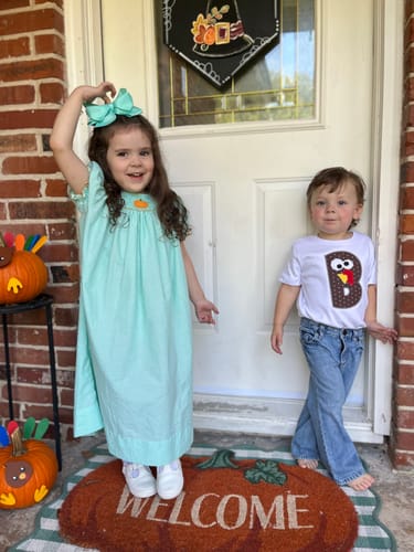 Customer photo review of Pumpkin Mint Polka Dot Smocked Bishop Dress