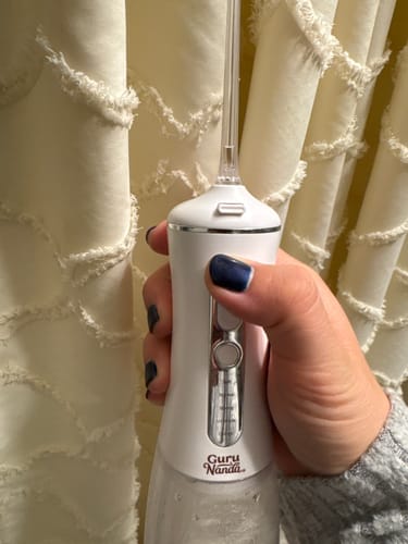 Customer photo review of (FREE) Advanced Dental Water Flosser 2.0 with UV Light (290ML)