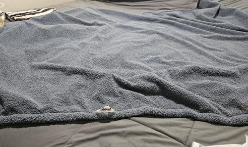 Customer photo review of The Snuggle Splash Blanket™ - Wet Cement